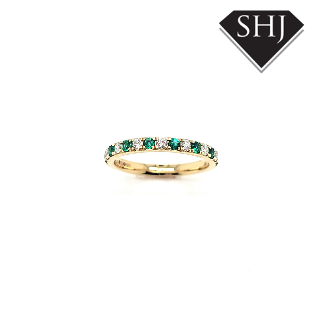18ct Emerald and Diamond Eternity Ring 0.59ct