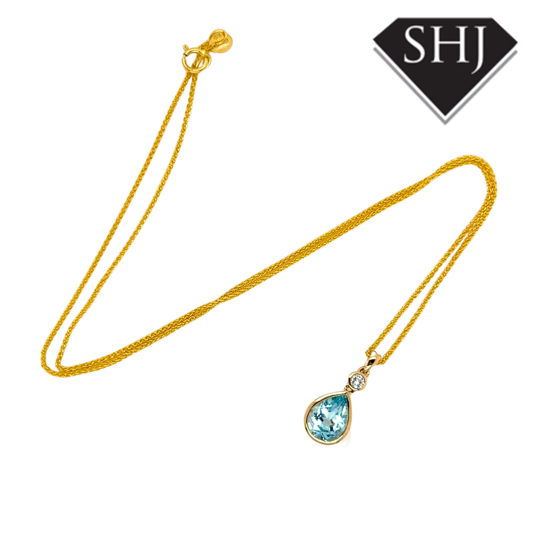 9ct Yellow Gold 1.94ct Blue Topas & 0.06ct Diamond Pendant