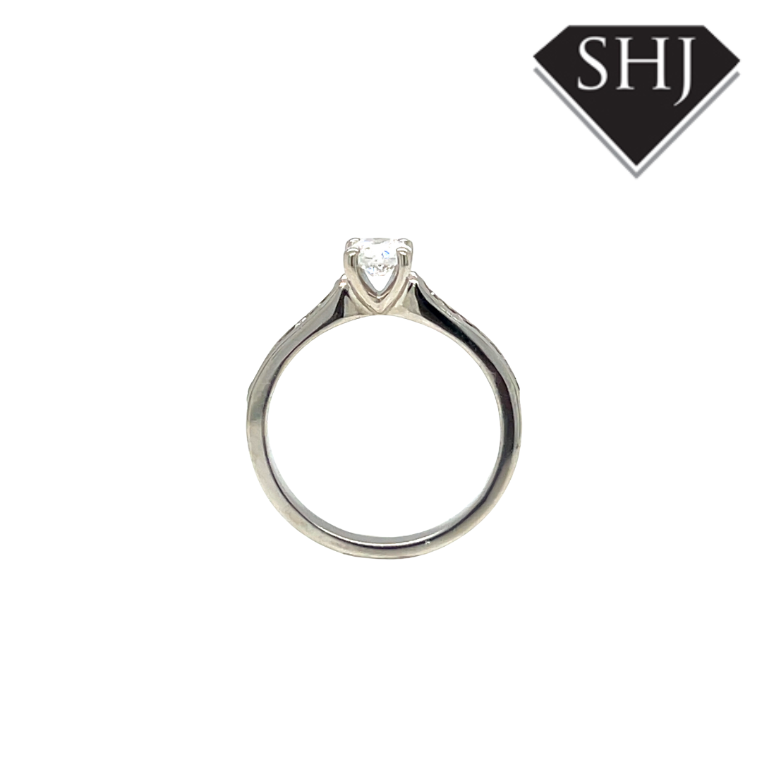 Platinum 0.40ct Diamond Solitaire 0.21ct Diamond Shoulders Ring