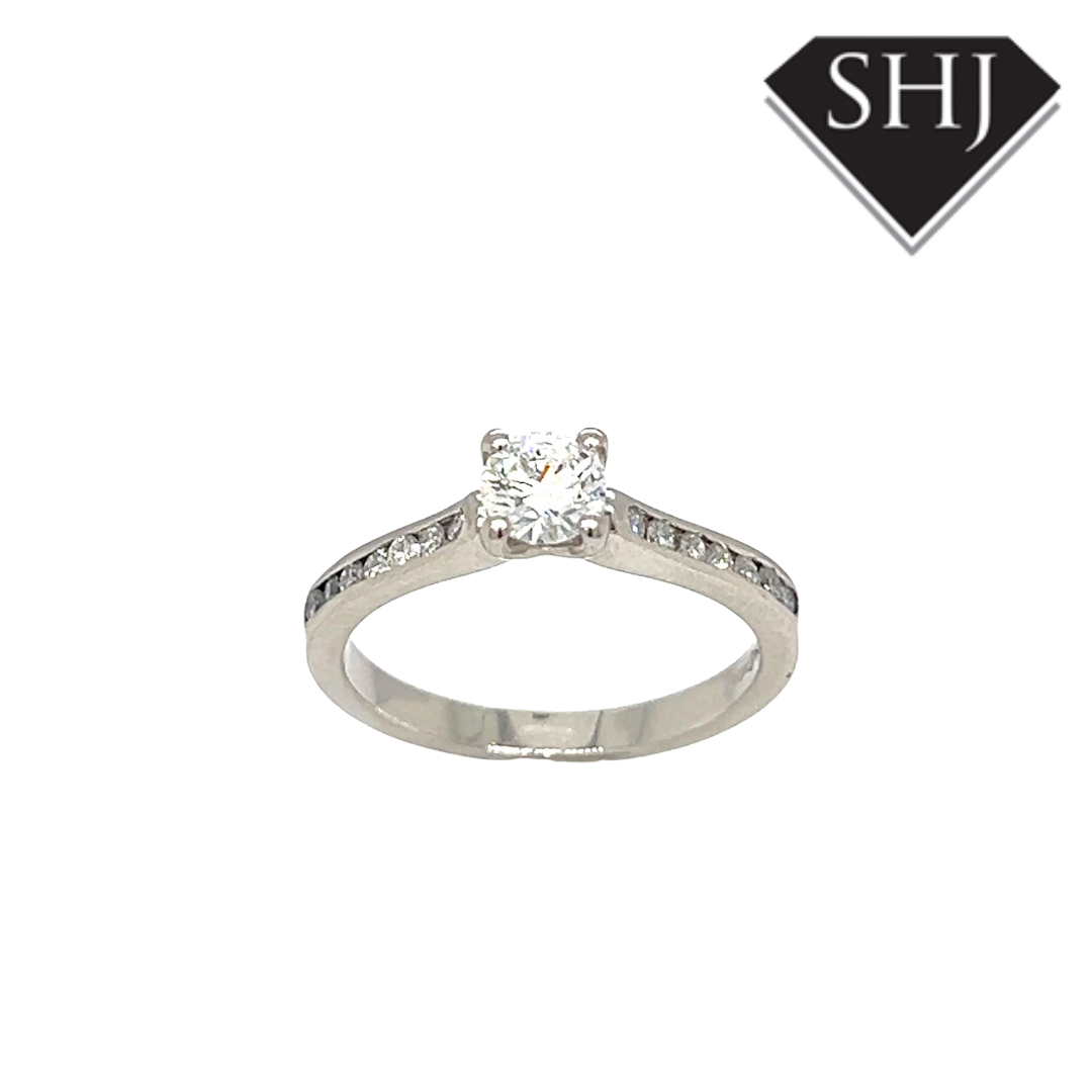 Platinum 0.40ct Diamond Solitaire 0.21ct Diamond Shoulders Ring