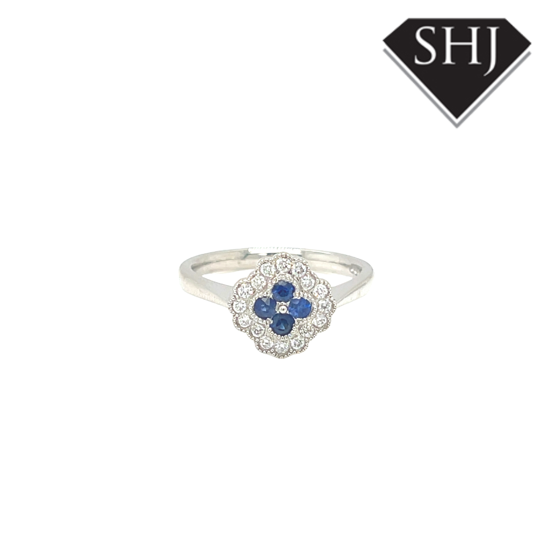 Platinum 0.18ct Diamond and Sapphire Ring