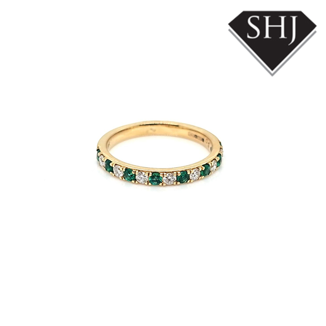 18ct Emerald and Diamond Eternity Ring 0.59ct