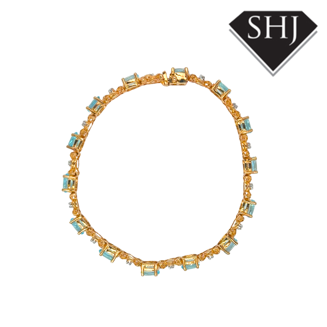 9ct Yellow Gold Blue Topas and Diamond Bracelet